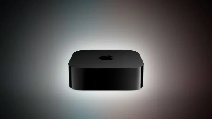 Zwarte Apple TV mediaplayer met het Apple logo op een donkere achtergrond.