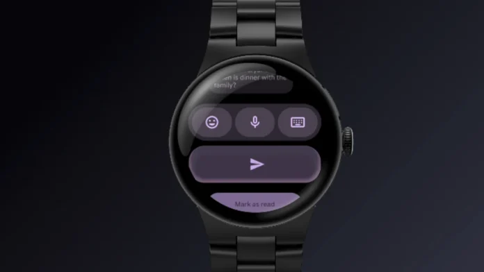 Zwarte Google Pixel Watch met metalen schakelband en berichteninterface op het scherm.