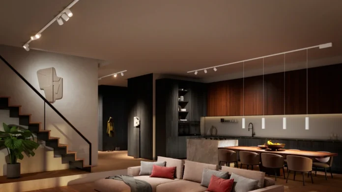 Moderne woonkamer met Philips Hue railverlichting en hanglampen voor een warme, sfeervolle uitstraling.