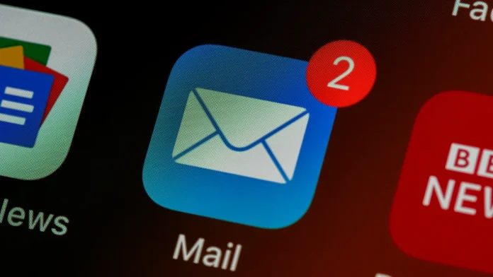 iOS Mail app icon with a red notification badge showing two unread emails on a smartphone screen.